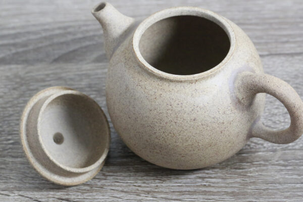 Large Clay Teapot on a Table
