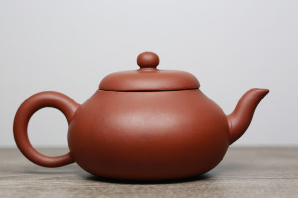Side view of Round Zisha Clay Teapot for 1-2 People