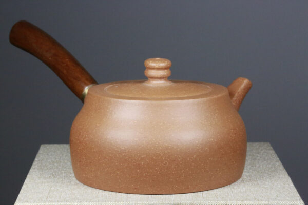 Zisha Teapot with Handle - Aged Zisha Duanni Clay on a Table