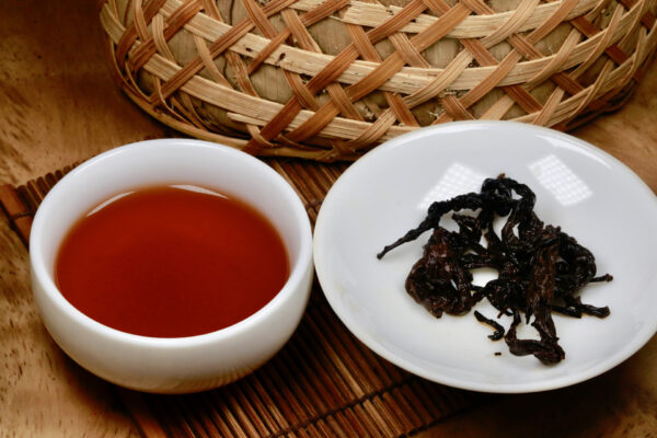 Tongxing Puerh Tea from 1980 on a Table - Aged Raw Puerh Tea