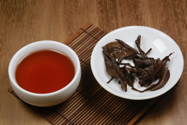 Aged Purple Tea on a Table - Ziyun Tea from 2008