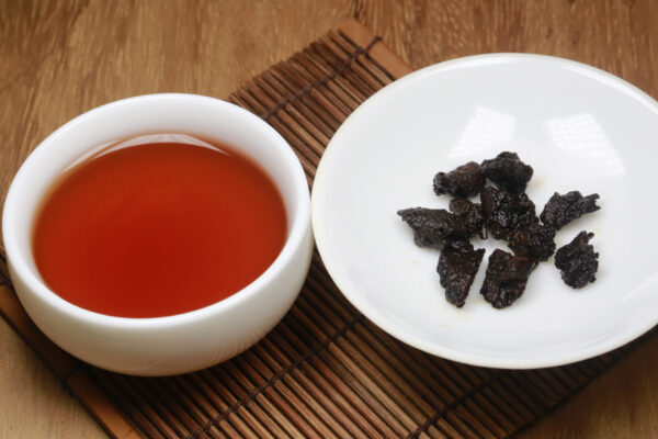 Cui Yingzi Puerh Tea on a Table - Ancient Style Puerh