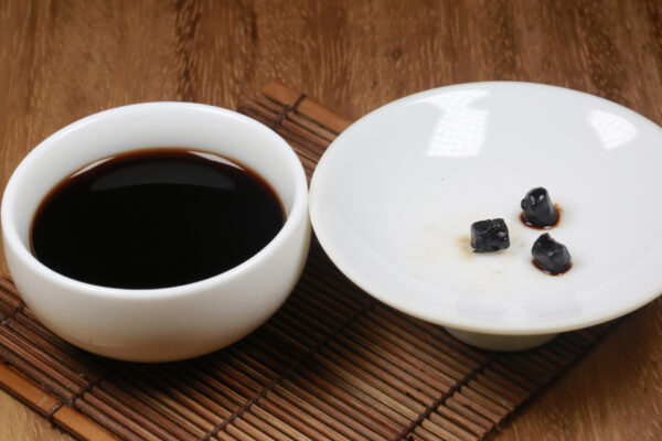 Chagao Puerh Tea on a Table - Puerh Extract from Tea Trees
