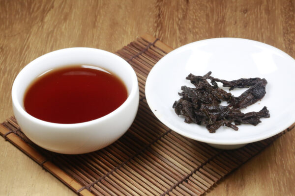 100 Year Old Puerh Tea on a Table - Vintage Puerh Tea with Strong Qi