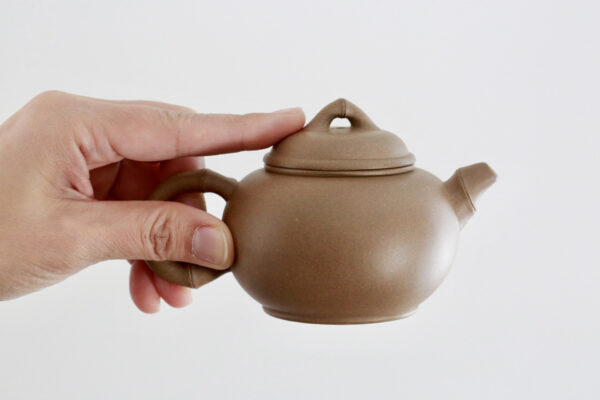 Side view of Aged Zisha Teapot - Duanni Clay with Artisan Design